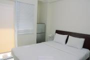 Comfort Studio at Green Pramuka City Apartment near Shopping Center By Travelio