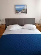 Apartment and room Gušćić