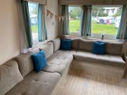 5 mins walk to beach. 3 bedroom caravan. Sleeps 8