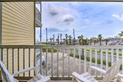 Colorful Coastal Condo Walk to Pier and Beach!