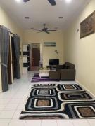 Top Tanah Merah