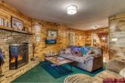Sunset Ridge Cabin - A Romantic Smoky Mountain Escape or Family Getaway with Privacy - behind Dollywood, large game room, jacuzzi tub, fire pit, large wrap-around deck, and more