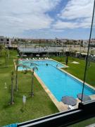Bel appartement pied sur mer vue imprenable sur piscine et jardins
