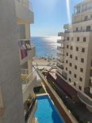 Apartamento Aquarium Park, 1ª linea de playa, piscina privada, aire acondicionado y wifi de alta velocidad