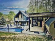 Wzgórza Kunowskie - domy na wynajem z basenem, baliami i saunami
