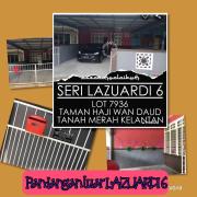 Top Tanah Merah