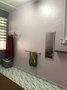 Top Tanah Merah