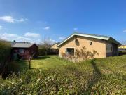 Strandnahes Ferienhaus mit Wintergarten grosser uneinsehbarer Garten