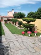 Casa con jardín en primera línea de playa