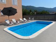 Apartments Ukić with a large outdoor swimming pool Apartments Ukić with a large outdoor swimming pool