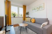 Cozy Apartment with Balcony Warszawa by Renters