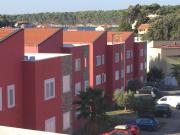 Apartments with a parking space Palit Rab  18900