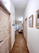 DOMUS HENRICUS -THREEROOM APARTMENT IN PORTO POLLO 400 Meters from the sea