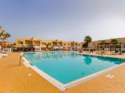 Modern 3 bedroom house with large pool and fast internet, 100ft from the sea - sleeps 6