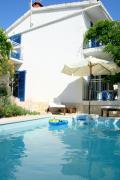 Family friendly apartments with a swimming pool Kaprije - 17692