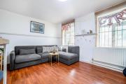 2 story apt on the ground floor at Clapham north