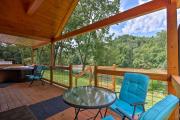 Deck and Hot Tub Bryson City Riverfront Cabin!