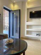 Cosy Studio on the First Floor with lovely Terrace and Personal Garden Area, Pool View and Free Beach Access in Sharm Hills Resort