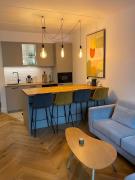 Modern 2-bedroom apartment with terrace & free parking