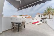 Beautiful apartments with large terrace close to the beach