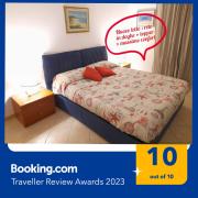 Casa Corallo Muravera Appartamento Centralissimo due camere letto cucina e soggiorno nuovo letto matrimoniale e singoli Aria condizionata Parcheggio interno Coperto ideale x 2 o 3 moto