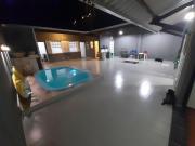 Casa com piscina, confortável e ótima localização