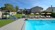 Estate with four stone villas and swimming pool in Buzet