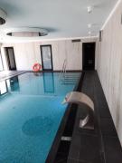 Apartament hotelowy Royal Solny Resort z aneksem kuchennym i dostępem do krytego basenu sauny i strefy SPA