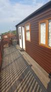 Holiday Lodge, sleeps 4, with sea & countryside views