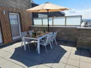 Duplex met zonnig zuidterras aan haven en zee