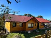 Casa y cabaña vista a las sierras