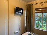 Safari Deluxe Rooms - elegant rooms with access to beautiful garden & pool