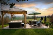 Linhay at East Trenean Farm -Luxury retreat for 2 with stunning rural views, private hot tub and EV charging
