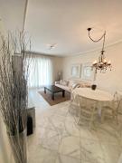 Elegant 2-Bedroom Apartment in Benidorm with Private Pool and Scenic Garden Views