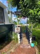 Cozy jungle boat hideaway with stunning ocean view