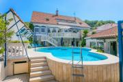 Family friendly apartments with a swimming pool Sumpetar, Omis - 21633