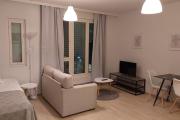 Top location studio in town right next to the train station and free parking Kotimaailma Apartments