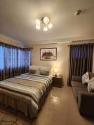 Condo , WIFI up to 100mbps , Infinity Pool