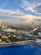 Classy 2BR Suite at Eastwood City with Pool and City Skyline View