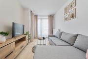 Nowoczesny Apartament z Balkonem i Parkingiem w Centrum Wrocławia by Renters