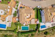 Villa con piscina climatizada y vistas al Golf