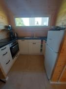 Dom Mazury w Ilawie,łódź rybacka,czerwony i zielony