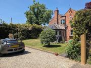 Rosebud Cottage in Shropshire with private drive & garden