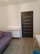 Uroczy Apartament z Garażem