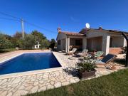 Villa Mirela with a comfortable garden and pool