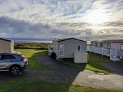 Beautiful Pet Friendly Southerness Caravan With Sea View & Decking Area Beautiful Pet Friendly Southerness Caravan With Sea View & Decking Area