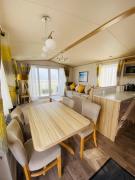 Gorgeous 7 Berth Caravan With Decking And Full Seaviews At Hopton Ref 80053S