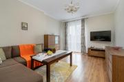 Traditionally Furnished Apartment with Balcony in Poznan by Renters