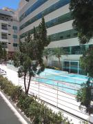 Apartamentos com piscinas na praia de Bombas