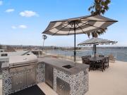 Stunning Bayfront condo with gorgeous views, garage, massive roof deck & AC - dogs welcome!